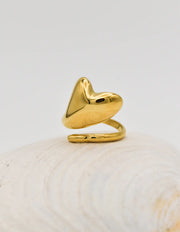 Side angle of golden pinky ring with open band