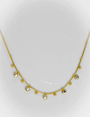 Close-up of minimalist gold chain necklace for clean girl jewellery