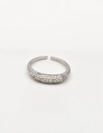 Silver pavé engagement ring on white background