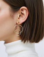 Minimalist gold double hoops with a clean stacked design, perfect for casual wear.