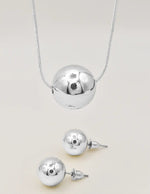 silver radiant orb duo necklace with circle pendant and matching studs montreal minimalist jewelry clean girl jewelry 2025