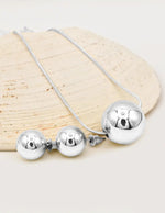 radiant silver orb duo set with oversized pendant and earrings, montreal minimalist jewelry, chic canadian gift for her jewelry 2025