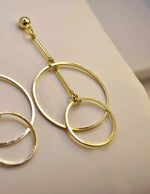 Timeless gold-plated double hoop earrings with a light, airy design for women.
