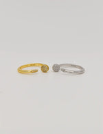 Gold and silver sparkle promise rings set side by side