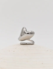 Silver love drop ring styled with dainty gold necklace