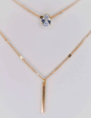 Waterproof gold chain necklace featuring vertical bar