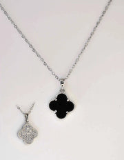 Reversible pendant necklace showing both sparkling and black sides detail