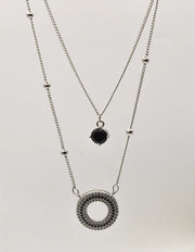 trendy silver circle pendant necklace with double chains and black stone detail, TikTok viral necklaces clean girl jewelry 2025