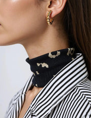 Twist Luxe Dangles styled with sleek open hairstyle
