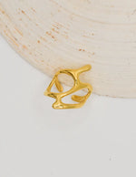 Stylish adjustable gold ring with sculpted curves, minimalist fashion accessory Canada