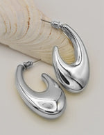 silver modern wave hoop earrings canada tiktok trending minimalist jewelry montreal style