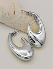 silver modern wave hoop earrings canada tiktok trending minimalist jewelry montreal style