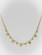 Close-up of minimalist gold chain necklace for clean girl jewellery