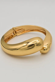 gold bangle bracelet open view showing locking hinge clasp