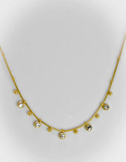 Minimalist gold necklace with dainty zircon and bead charms