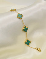 elegant_goden_clover_bracelet_with_green_stone_links_montreal_jewelry_store