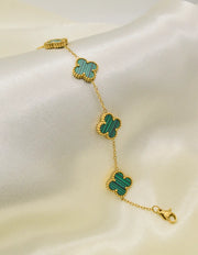 elegant_goden_clover_bracelet_with_green_stone_links_montreal_jewelry_store