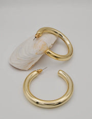 golden_shiny_hoops_earrings_for_women