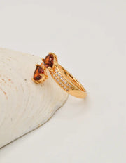 indian rings canada golden flame teardrop ring styled on seashell with sparkling gemstones montreal minimalist jewelry