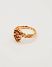 indian rings canada golden flame teardrop ring styled on seashell with sparkling gemstones montreal minimalist jewelry