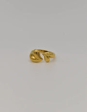 Close-up of heart-inspired 14k gold wedding ring front view