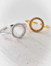 Engagement ring flat lay with clean white background