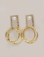 elegant dangling earrings with pearls and gold circle hoops, perfect statement jewellery Canada for weddings and parties