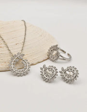 luxe leaf swirl sparkle set featuring circle pendant necklace canada, silver ring and earrings, clean girl jewelry 2025