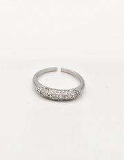 Silver pavé engagement ring on white background