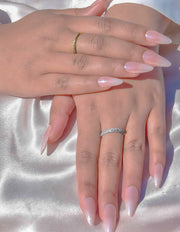 Close-up of diamond glow gold and silver wedding band ring