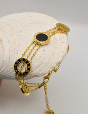 goden_layered_bracelet_with_black_enamel_and_roman_numerals_canada_fashion_accessory