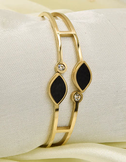 modern_open_golden_bracelet_with_black_stones_and_clear_gemstones