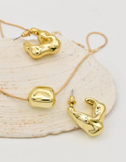 trendy gold jewellery set with organic hoop earrings and dainty necklace, clean girl jewelry 2025 Canada