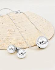 silver radiant orb jewelry set with bold circle pendant necklace and earrings perfect for layering jewelry for women in canada