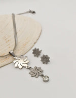 elegant silver swirl jewellery set with crystal pendant and earrings montreal