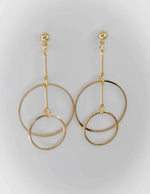 Sleek gold double hoop earrings crafted for comfort and a modern style touch.

