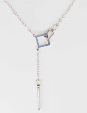 Minimalist silver necklace featuring bar drop charm