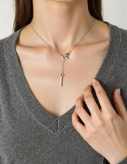 Silver locket necklace with interlocked square pendants