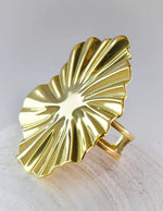 TikTok viral adjustable ring featuring sculpted starburst pattern