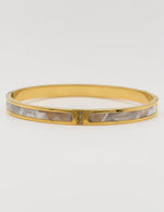 18K gold-plated bangle with protective evil eye styling