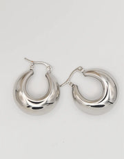 Side view of polished sterling silver earrings